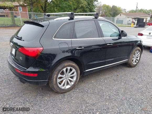 2016 Audi Q5 Premium with VIN WA1C2AFP9GA048614, listed as a IAAI auction lot 40426790 with 103,918 mi miles. Bid and sale history available at carsss.com. Image 4.
