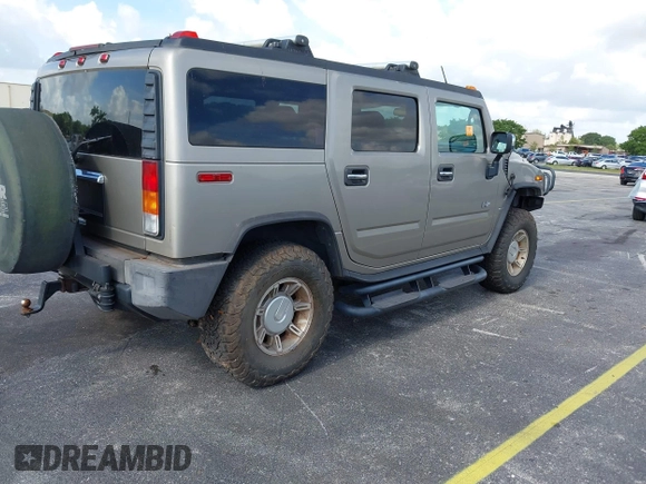 2003 Hummer H2 z VIN 5GRGN23U63H131139, wystawiony jako IAAI lot #42540561 z przebiegiem 182 365 mil mil oraz . Historia ofert i sprzedaży dostępna na DreamBid. Obrazek 4.