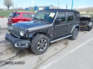 2019 Jeep Wrangler Unlimited Sahara with VIN 1C4HJXEN3KW622167, listed as a IAAI auction lot 41880702 with 72,928 mi miles and . Bid and sale history available at DreamBid. Image 2.
