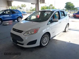 2013 Ford C-Max SE z VIN 1FADP5AU2DL541573, wystawiony jako IAAI lot #42233822 z przebiegiem 127 650 mil mil oraz . Historia ofert i sprzedaży dostępna na DreamBid. Obrazek 6.