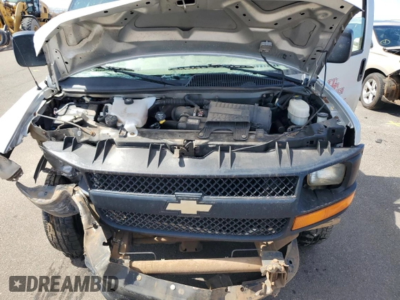 2011 Chevrolet Express Passenger LS z VIN 1GNSGBF4XB1169764, wystawiony jako Copart lot #64512794 z przebiegiem 75 532 mil mil oraz Szkoda całkowita • Salvage title. Historia ofert i sprzedaży dostępna na DreamBid. Obrazek 12.
