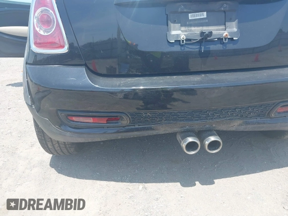 2013 MINI Convertible S with VIN WMWZP3C59DT550746, listed as a IAAI auction lot 39538986 with 59,934 mi miles and . Bid and sale history available at DreamBid. Image 15.