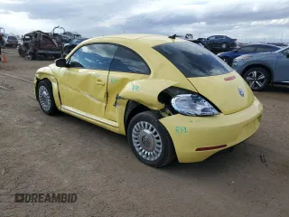 2014 Volkswagen Beetle with VIN 3VWHX7AT6EM632938, listed as a Copart auction lot 58599124 with 89,546 mi miles and Salvage Title. Bid and sale history available at DreamBid. Image 2.