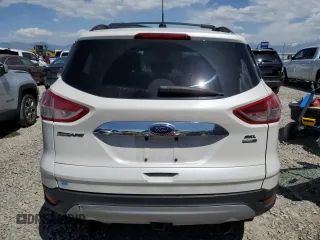 2013 Ford Escape SEL z VIN 1FMCU9H9XDUC15081, wystawiony jako Copart lot #58034165 z przebiegiem 166 612 mil mil oraz Szkoda całkowita • Salvage title. Historia ofert i sprzedaży dostępna na DreamBid. Obrazek 6.