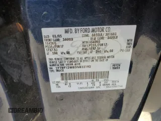 2005 Ford F-150 XL with VIN 1FTRF12W85NB33192, listed as a Copart auction lot 57240225 with 104,331 mi miles and Salvage title. Bid and sale history available at DreamBid. Image 12.