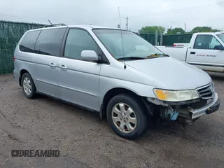 2002 Honda Odyssey EX z VIN 5FNRL18642B005803, wystawiony jako IAAI lot #42205075 z przebiegiem 201 043 mil mil oraz . Historia ofert i sprzedaży dostępna na DreamBid. Obrazek 1.