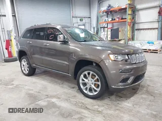 2020 Jeep Grand Cherokee Summit with VIN 1C4RJFJG1LC170714, listed as a IAAI auction lot 42247702 with 78,614 mi miles and . Bid and sale history available at DreamBid. Image 1.