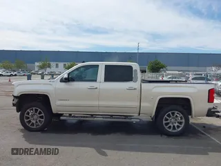 2014 GMC Sierra 1500 Denali z VIN 3GTU2WEJ3EG551266, wystawiony jako IAAI lot #41631624 z przebiegiem 120 214 mil mil oraz . Historia ofert i sprzedaży dostępna na DreamBid. Obrazek 15.