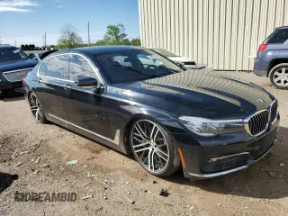 2018 BMW 7 Series 740i with VIN WBA7E2C57JG742193, listed as a Copart auction lot 79301864 with 87,706 mi miles and Salvage Title. Bid and sale history available at carsss.com. Image 4.