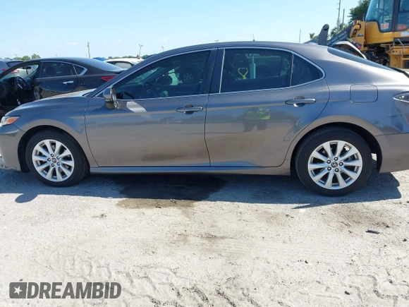 2019 Toyota Camry LE with VIN 4T1B11HK4KU286959, listed as a IAAI auction lot 42063344 with 92,481 mi miles and . Bid and sale history available at DreamBid. Image 14.