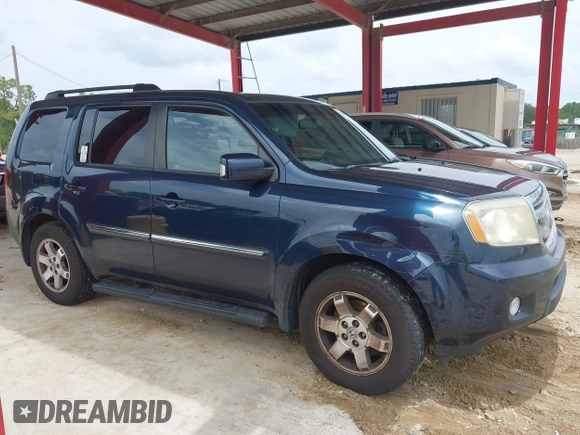 2011 Honda Pilot Touring z VIN 5FNYF3H94BB032105, wystawiony jako IAAI lot #42435522 z przebiegiem 247 899 mil mil oraz . Historia ofert i sprzedaży dostępna na DreamBid. Obrazek 13.