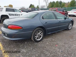 2001 Chrysler LHS z VIN 2C3HC56G01H562025, wystawiony jako IAAI lot #40875197 z przebiegiem 282 882 mil mil oraz . Historia ofert i sprzedaży dostępna na DreamBid. Obrazek 4.