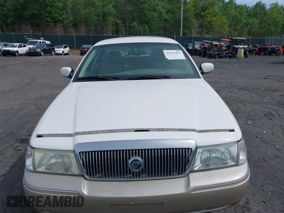 2004 Mercury Grand Marquis LS Premium z VIN 2MEFM75W04X678032, wystawiony jako IAAI lot #42341419 z przebiegiem 114 502 mil mil oraz . Historia ofert i sprzedaży dostępna na DreamBid. Obrazek 6.
