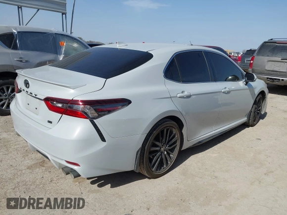 2023 Toyota Camry SE z VIN 4T1G11AK2PU128367, wystawiony jako IAAI lot #41699516 z przebiegiem 27 270 mil mil oraz . Historia ofert i sprzedaży dostępna na DreamBid. Obrazek 4.