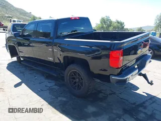 2014 Chevrolet Silverado 1500 LT with VIN 3GCPCREC5EG484876, listed as a IAAI auction lot 41867292 with 118,341 mi miles and . Bid and sale history available at DreamBid. Image 3.
