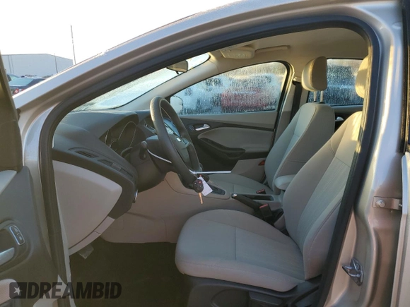2018 Ford Focus SE z VIN 1FADP3FE8JL331853, wystawiony jako Copart lot #74013984 z przebiegiem 73 237 mil mil oraz Szkoda całkowita • Salvage title. Historia ofert i sprzedaży dostępna na DreamBid. Obrazek 7.