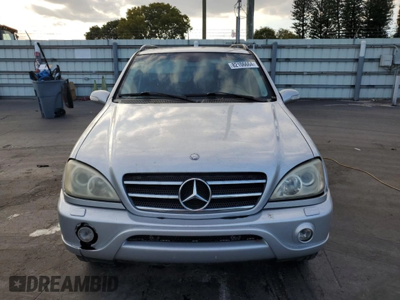2002 Mercedes-Benz M-Class with VIN 4JGAB75EX2A326747, listed as a Copart auction lot 82106664 with 264,245 mi miles and Salvage Title. Bid and sale history available at carsss.com. Image 5.