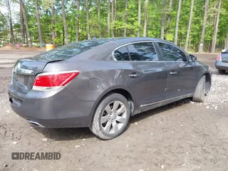 2012 Buick LaCrosse Premium 3 z VIN 1G4GH5E31CF310937, wystawiony jako IAAI lot #42092530 z przebiegiem 165 295 mil mil oraz . Historia ofert i sprzedaży dostępna na DreamBid. Obrazek 4.