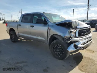 2012 Toyota Tundra 4WD Truck with VIN 5TFDY5F17CX221582, listed as a Copart auction lot 50777385 with 158,021 mi miles and Salvage Title. Bid and sale history available at carsss.com. Image 4.