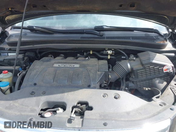 2010 Honda Odyssey Touring with VIN 5FNRL3H97AB104359, listed as a IAAI auction lot 42555872 with 233,952 mi miles and . Bid and sale history available at DreamBid. Image 10.