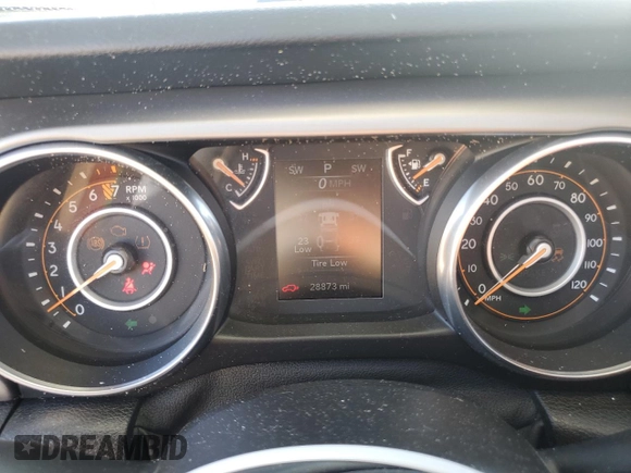 2020 Jeep Wrangler Willys with VIN 1C4GJXAG5LW307083, listed as a Copart auction lot 86994744 with 28,873 mi miles and Salvage title. Bid and sale history available at DreamBid. Image 9.