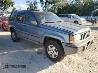 1995 Jeep Grand Cherokee Laredo with VIN 1J4FX58S4SC742471, listed as a Copart auction lot 76203034 with 206,717 mi miles and Non Repairable. Bid and sale history available at carsss.com. Image 4.