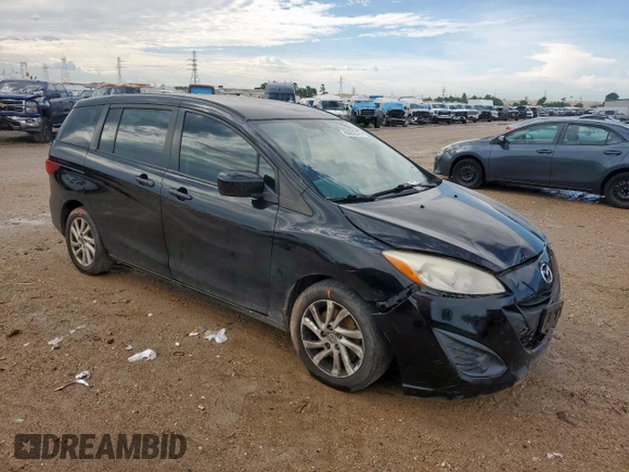 2012 Mazda 5 Sport with VIN JM1CW2BL6C0120288, listed as a Copart auction lot 60252315 with 127,494 mi miles and Salvage title. Bid and sale history available at DreamBid. Image 4.