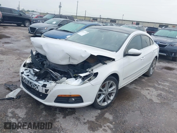 2009 Volkswagen CC Luxury with VIN WVWHL73C39E528446, listed as a IAAI auction lot 42130302 with 231,066 mi miles. Bid and sale history available at carsss.com. Image 2.