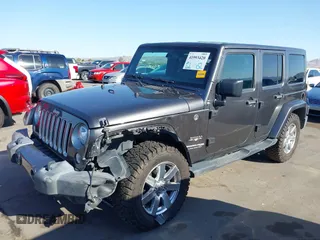 2018 Jeep Wrangler JK Unlimited Altitude with VIN 1C4BJWEG9JL802853, listed as a IAAI auction lot 41993420 with 51,742 mi miles. Bid and sale history available at carsss.com. Image 2.