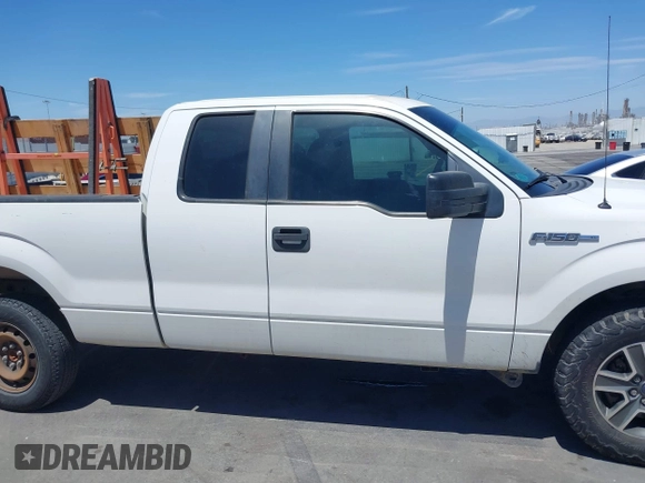 2014 Ford F-150 XL with VIN 1FTEX1CMXEFD13082, listed as a IAAI auction lot 40035539 with 204,751 mi miles and . Bid and sale history available at DreamBid. Image 14.
