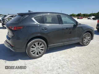 2024 Mazda CX-5 2.5 Turbo Signature with VIN JM3KFBXY2R0354346, listed as a Copart auction lot 49260525 with 9,571 mi miles and Salvage Title. Bid and sale history available at carsss.com. Image 3.