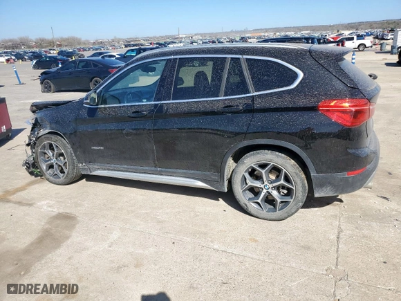 2018 BMW X1 sDrive28i with VIN WBXHU7C31J5H39068, listed as a Copart auction lot 49018985 with 100,611 mi miles and Salvage Title. Bid and sale history available at carsss.com. Image 2.