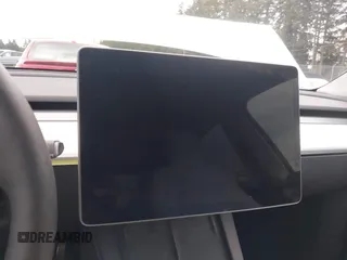 2023 Tesla Model Y Long Range z VIN 7SAYGAEEXPF647352, wystawiony jako IAAI lot #41955933 z przebiegiem Nie podano mil oraz . Historia ofert i sprzedaży dostępna na DreamBid. Obrazek 7.