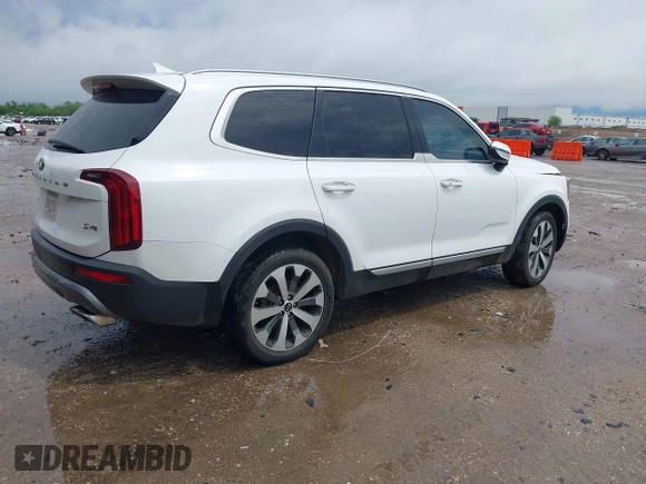 2021 Kia Telluride S with VIN 5XYP6DHC1MG103401, listed as a IAAI auction lot 42174602 with 125,118 mi miles and . Bid and sale history available at DreamBid. Image 4.