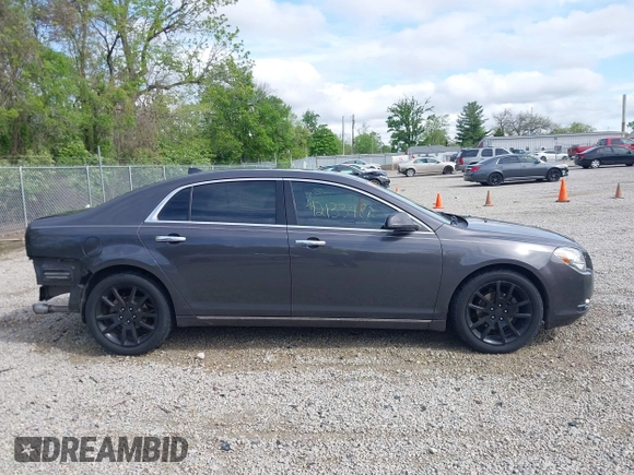 2012 Chevrolet Malibu LTZ with VIN 1G1ZG5E74CF297032, listed as a IAAI auction lot 42133482 with 82,682 mi miles and . Bid and sale history available at DreamBid. Image 14.