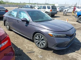 2024 Honda Civic EX-L z VIN 19XFL1H78RE016296, wystawiony jako IAAI lot #42061077 z przebiegiem 23 734 mil mil oraz . Historia ofert i sprzedaży dostępna na DreamBid. Obrazek 1.