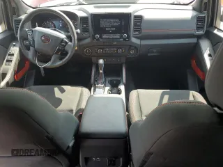 2022 Nissan Frontier Pro-4X with VIN 1N6ED1EK1NN601886, listed as a Copart auction lot 65182295 with 51,879 mi miles and Salvage title. Bid and sale history available at DreamBid. Image 8.