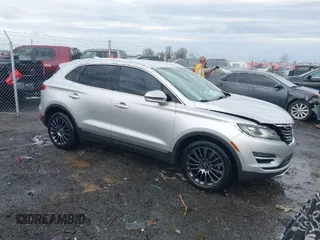 2015 Lincoln MKC with VIN 5LMCJ1A95FUJ20349, listed as a IAAI auction lot 41695129 with 140,878 mi miles. Bid and sale history available at carsss.com. Image 1.