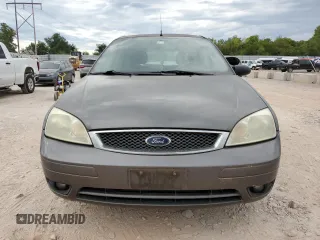 2007 Ford Focus S with VIN 1FAHP37N07W331532, listed as a Copart auction lot 71894104 with 183,909 mi miles and Clean Title. Bid and sale history available at carsss.com. Image 5.
