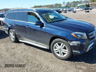 2019 Mercedes-Benz GLS with VIN 4JGDF6EE5KB233575, listed as a IAAI auction lot 41854585 with 57,287 mi miles. Bid and sale history available at carsss.com. Image 1.