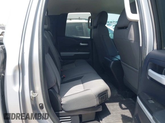 2016 Toyota Tundra SR z VIN 5TFRM5F1XGX099453, wystawiony jako IAAI lot #42492840 z przebiegiem 54 060 mil mil oraz . Historia ofert i sprzedaży dostępna na DreamBid. Obrazek 8.
