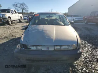 1997 Saturn SL with VIN 1G8ZH5286VZ225732, listed as a Copart auction lot 87618845 with 227,973 mi miles and Salvage Title. Bid and sale history available at carsss.com. Image 5.
