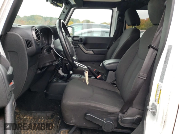 2018 Jeep Wrangler JK Unlimited Sport S with VIN 1C4BJWDG9JL825714, listed as a Copart auction lot 73287794 with 103,643 mi miles and Salvage Title. Bid and sale history available at carsss.com. Image 7.