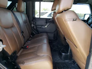 2013 Jeep Wrangler Unlimited Moab with VIN 1C4HJWEG7DL600043, listed as a Copart auction lot 52146945 with 118,882 mi miles and Salvage title. Bid and sale history available at DreamBid. Image 11.