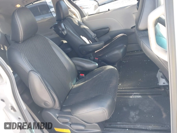 2014 Toyota Sienna SE with VIN 5TDXK3DC4ES487772, listed as a IAAI auction lot 41218295 with 153,368 mi miles and . Bid and sale history available at DreamBid. Image 8.