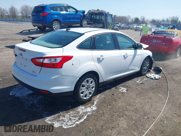 2012 Ford Focus SE with VIN 1FAHP3F20CL473141, listed as a IAAI auction lot 41776178 with 112,777 mi miles and . Bid and sale history available at DreamBid. Image 4.
