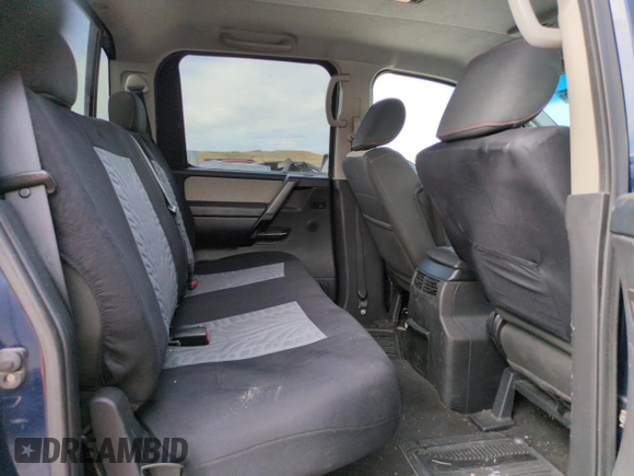 2011 Nissan Titan Pro-4X with VIN 1N6BA0EC3BN322837, listed as a Copart auction lot 60617675 with 196,657 mi miles and Salvage title. Bid and sale history available at DreamBid. Image 10.