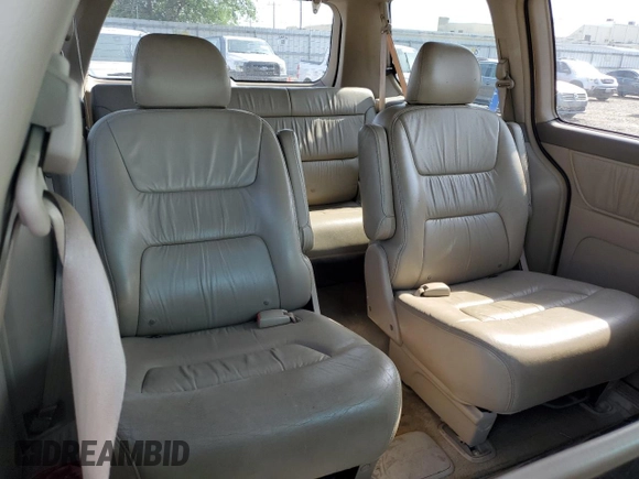 2004 Honda Odyssey EX-L with VIN 5FNRL18934B107378, listed as a Copart auction lot 51972795 with 186,043 mi miles and Salvage Title. Bid and sale history available at DreamBid. Image 12.
