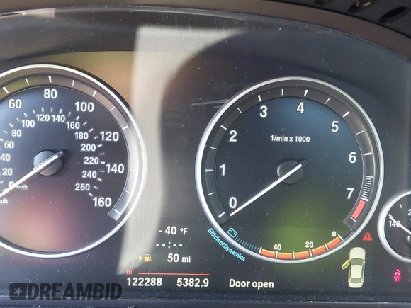 2014 BMW 5 Series 535i with VIN WBA5B1C54ED477525, listed as a IAAI auction lot 41692887 with 122,288 mi miles. Bid and sale history available at carsss.com. Image 7.