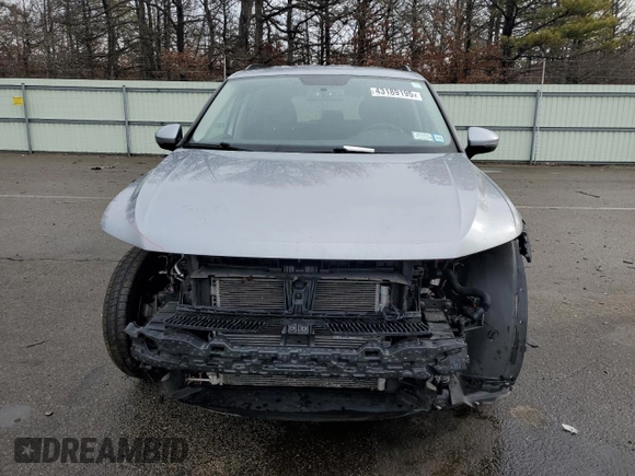 2022 Volkswagen Tiguan S with VIN 3VV0B7AX0NM057030, listed as a Copart auction lot 43189195 with 34,015 mi miles and Salvage title. Bid and sale history available at DreamBid. Image 5.